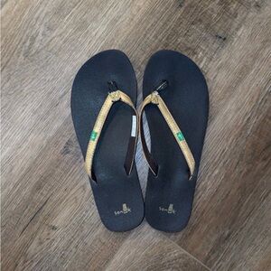 Sanuk Women's Black and Gold Flip Flops